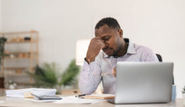 African American Man Having Difficulty Concentrating Due to Low Testosterone