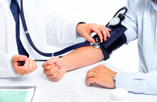 Man Getting Blood Pressure Checked